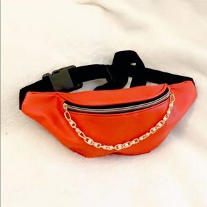 Red fanny pack.